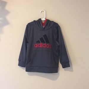 Dark gray and red Adidas hoody pull over.